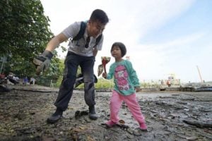 Father teaching daughter about rubbish, Environment, Living sustainably as a homeowner, Style Degree, Singapore, SG, StyleMag