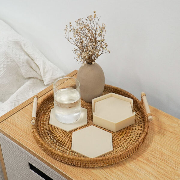 Our Earthly Drink Coasters (6pc Set With Holder) helps to prevent heat and water stains on your tables! Choose from 5 earthly colours depending on your dining room style. Its silicone material allows for fuss-free cleaning, and is perfect for any temperature of beverages.