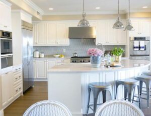 White curved kitchen island in white kitchen, White kitchen with curved kitchen island, Style Degree, Singapore, SG, StyleMag.