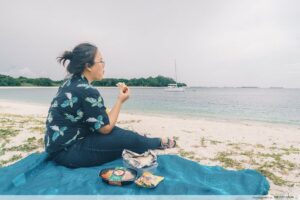 Picnic at lazarus island, Woman eating at lazarus island, Style Degree, Singapore, SG, StyleMag.